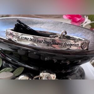 Brighton Footprints Silver Hinged Bangle Bracelet with tassel